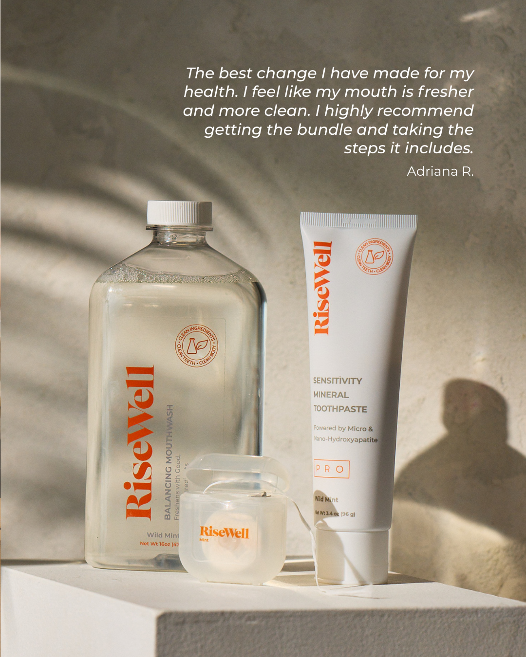 RiseWell dental care products on a neutral background with a quote from a satisfied customer.